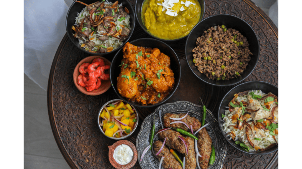 Different kinds of food on a tray.|Street food place|Street food in Fiji