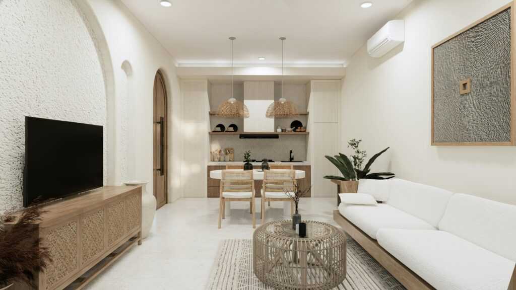 Cozy minimalist living room interior with dining area, modern decor, and natural elements in Bali villa.