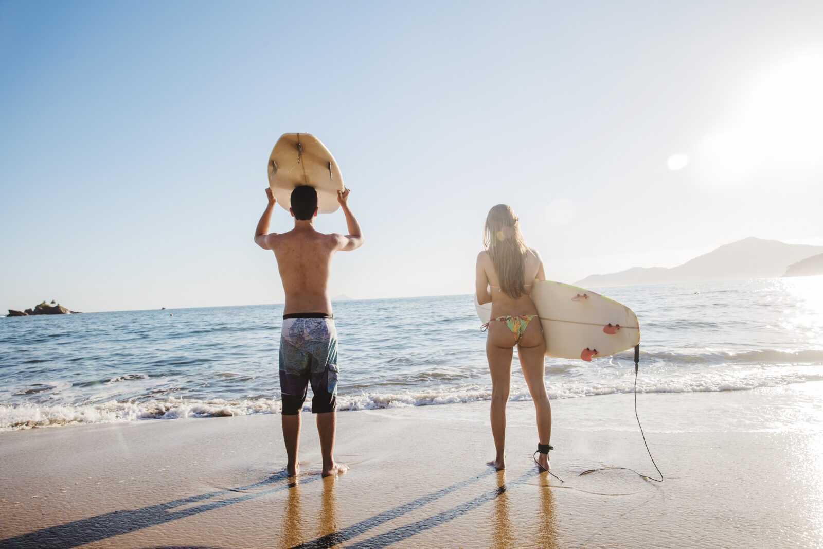 couple surfers waiting waves