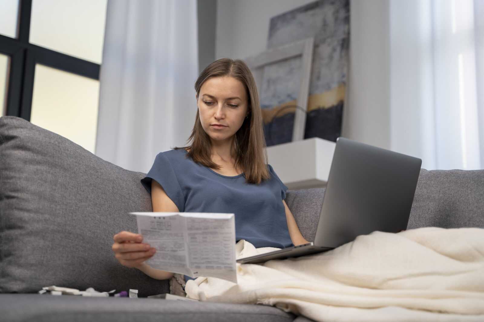 woman reading instructions covid test home